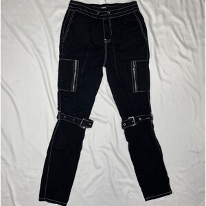Hot Topic brand black cargo pants with white stitching and grommet buckles
